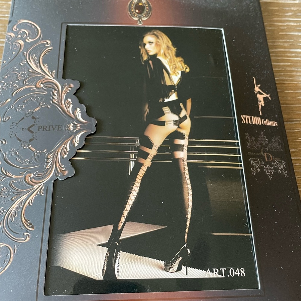 Prive Fashion Tights size S/M. Black lace up pattern